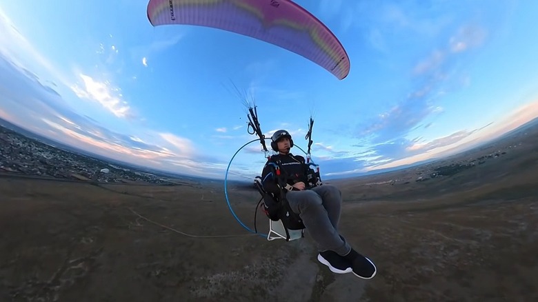 Jacob Hutzler commuting to work in Pueblo, Colorado using his paramotor.