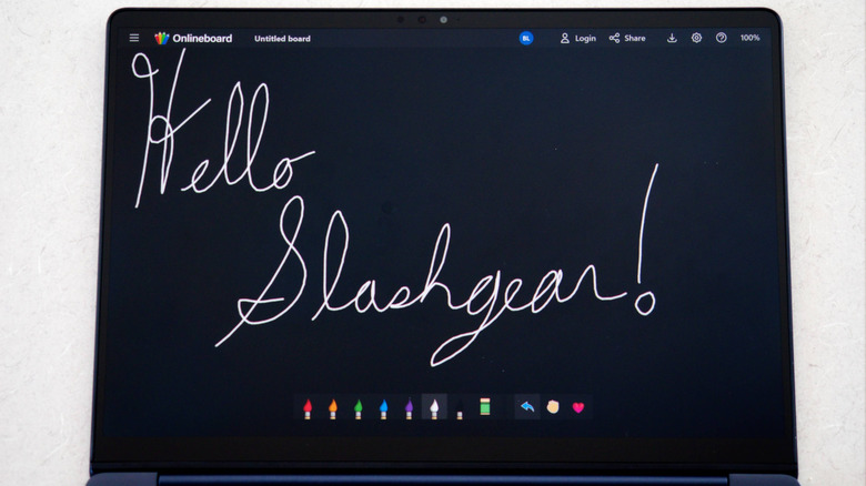 Close-up of Dell 14S touchscreen with "Hello Slashgear!" greeting