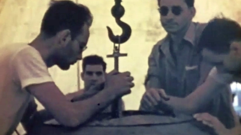 Louis Slotin & Harry K. Daghlian Jr. perform nuclear tests in New Mexico