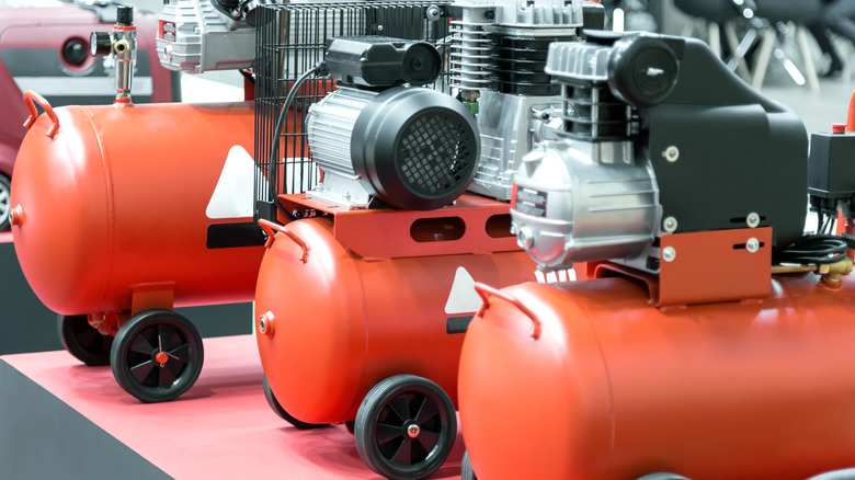Three air compressors in a row.