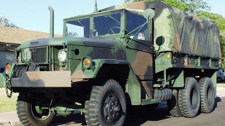 Camouflage colored Deuce and a Half military truck