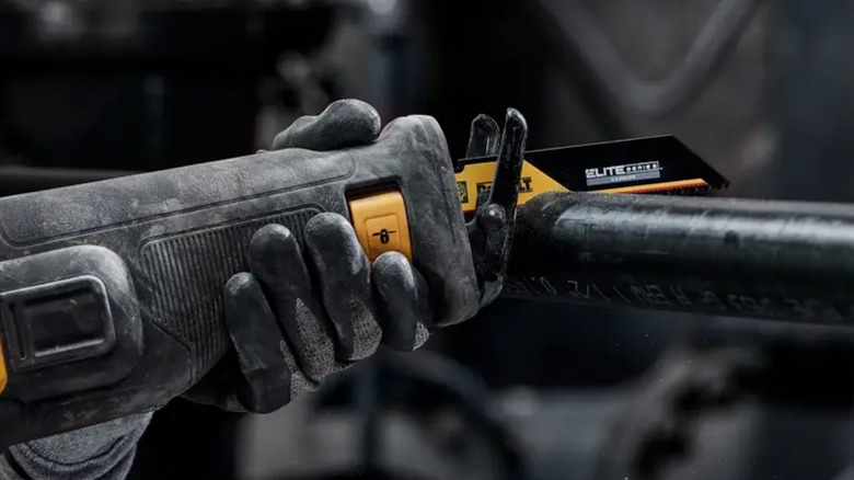 A person using an Elite Series DeWalt saw blade.