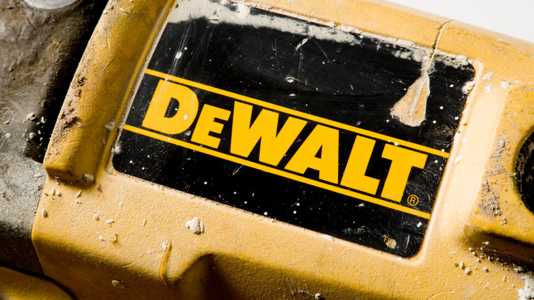Logo for DeWalt tools on side of well-used device