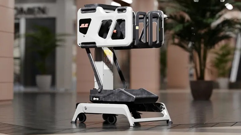 A JLG Industries Lift Pod in an office lobby.