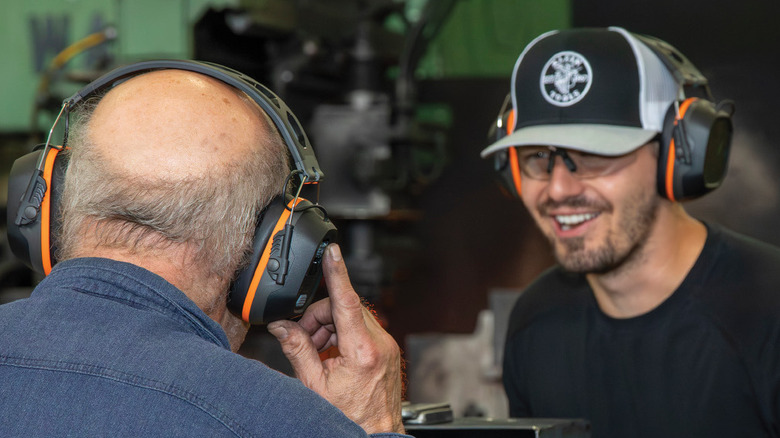 Two men wearing Situational Awareness Bluetooth Earmuffs