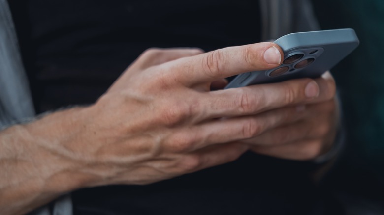 person holding iPhone