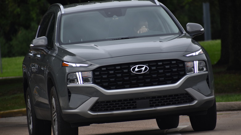 Person driving Hyundai SUV