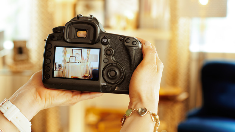 Canon DSLR taking photo of room