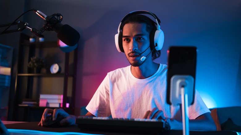 Gamer live streaming at desk