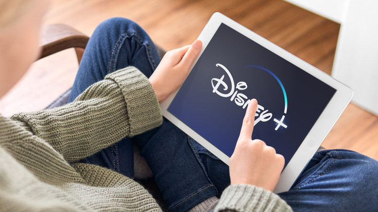 Young girl watching Disney+