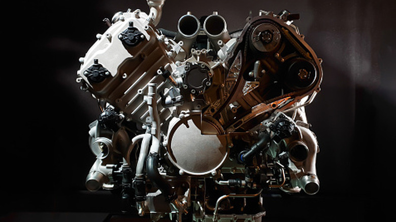 Frontal view of a double overhead cam V8 engine on test stand