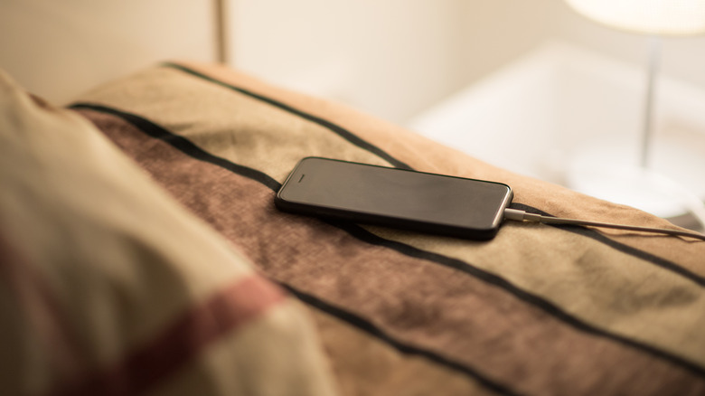 Phone charging by bedside