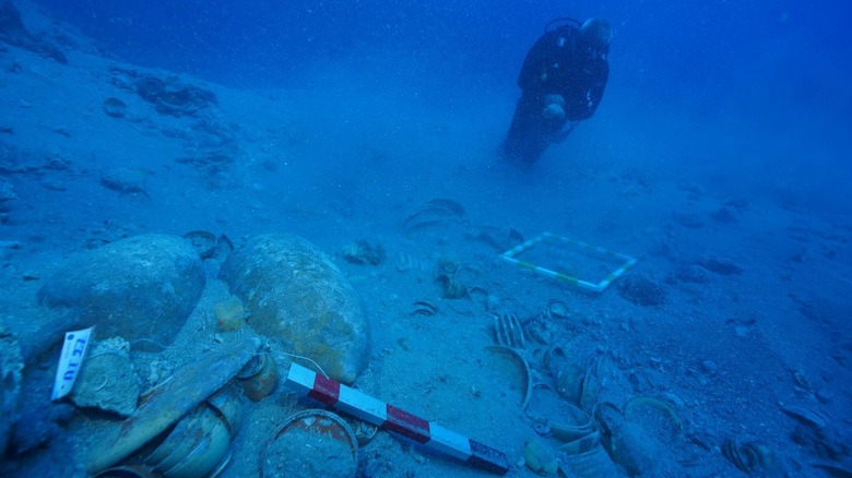 A diver examines ancient shipwreck off the coast of Turkey underwater