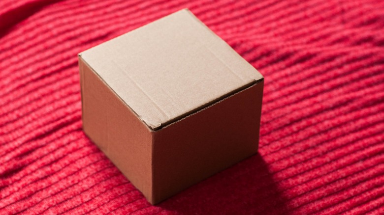 Using cardboard to make a prototype subwoofer enclosure.