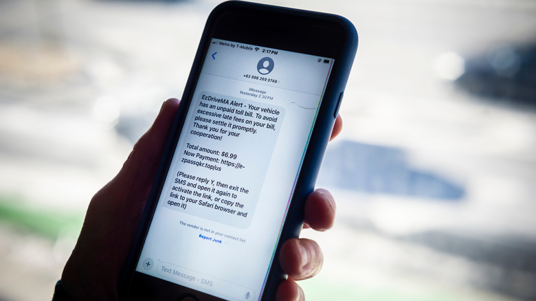 A scam text message on a smartphone.