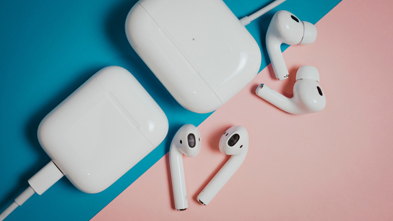 AirPods Pro 2 and AirPods 2 next to their plugged-in cases