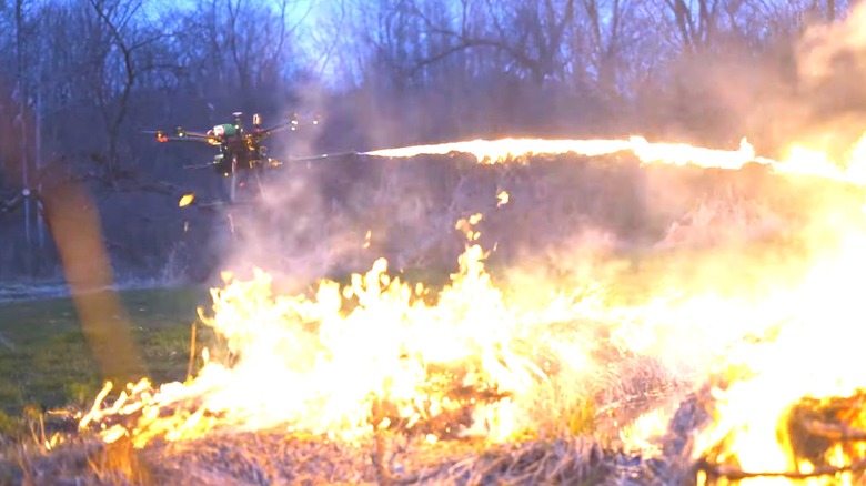 A Drone With A Flamethrower Attachment Setting An Area Ablaze