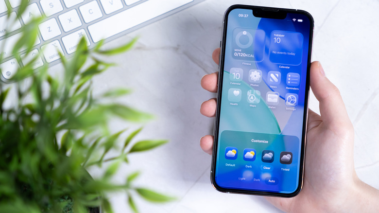 iOS 26 featuring Liquid Glass design with customizable interface