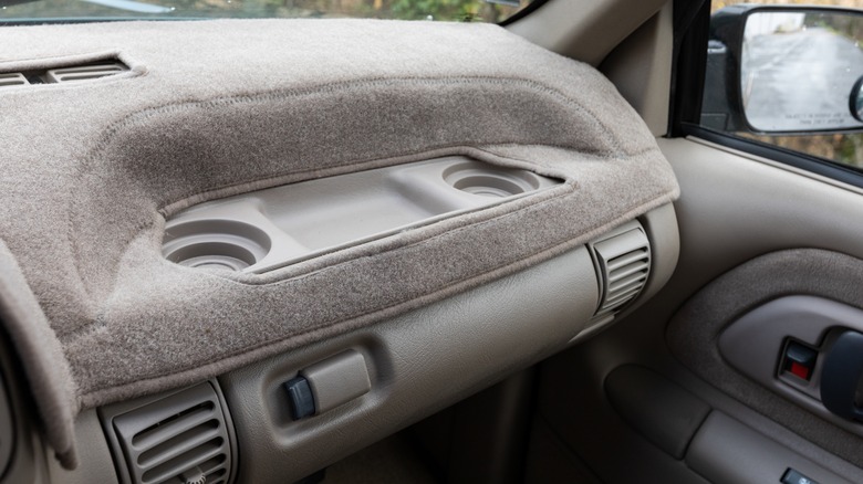 Car with dashboard cover