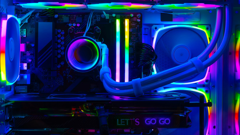 A custom built PC tower lit up with RGB LEDs