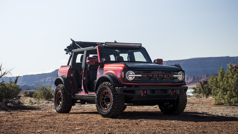 Ford Bronco with doors off, off-road, front-right view