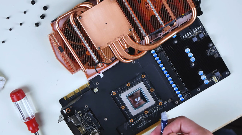 Pea-size thermal paste applied on GPU