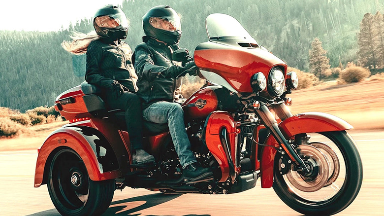 Harley-Davidson trike cruising down the road