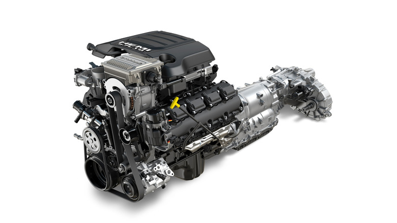 Complete 5.7L Hemi powertrain of Ram 1500 with transmission and transfer case, front-left view