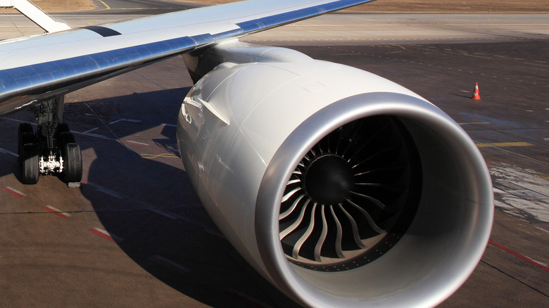 large engine of a starting aircraft on an airfield