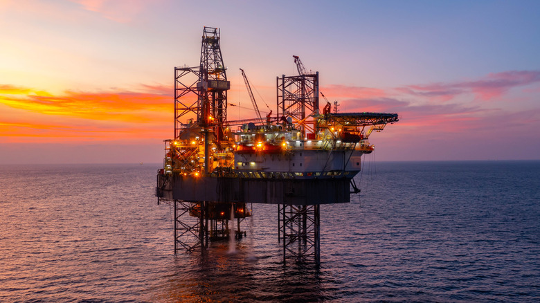 offshore oil rig at sunset