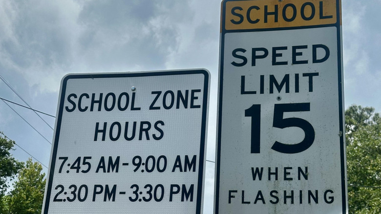 Close up on a school speed limit sign