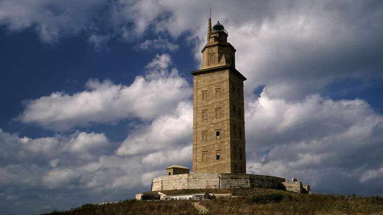 The Tower of Hercules lighthouse against cloudy sky in Spain