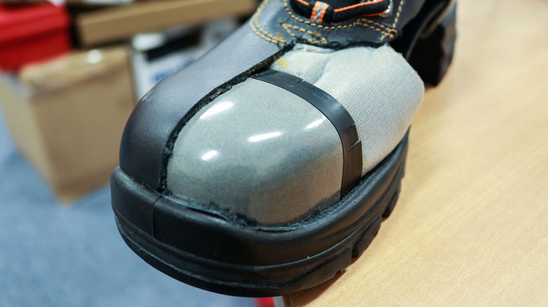 Cross section of a steel toe boot showing its toe cap