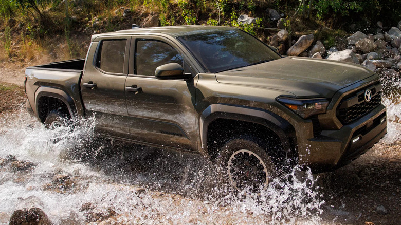 Side shot of a Toyota Tacoma off-roading