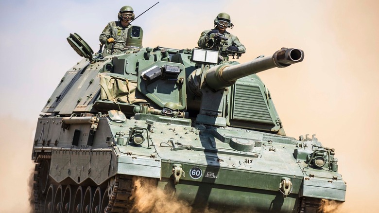 Lithuanian PzH 2000 howitzer in operation with two personnel visible