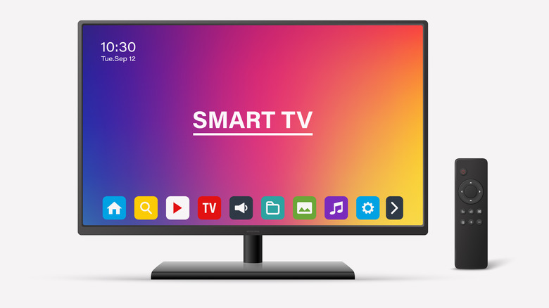 A smart TV with a remote next to it