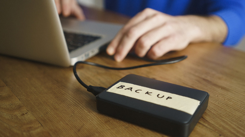 External USB drive plugged into a laptop