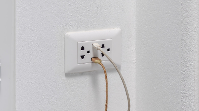 USB wall scokets with cables plugged