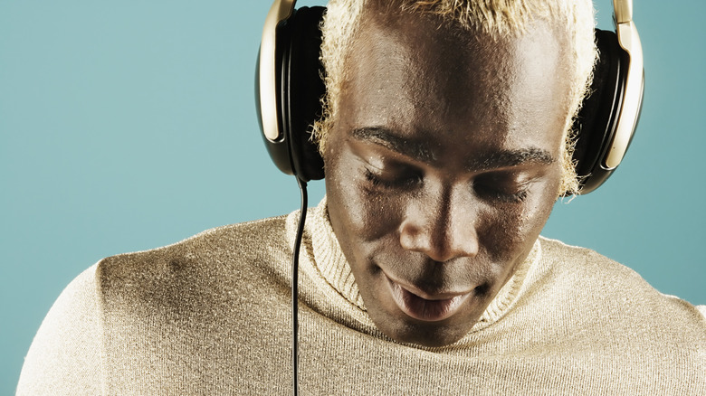 man listening to headphones