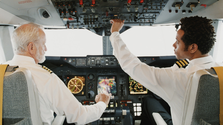 Airline pilots in cockpit
