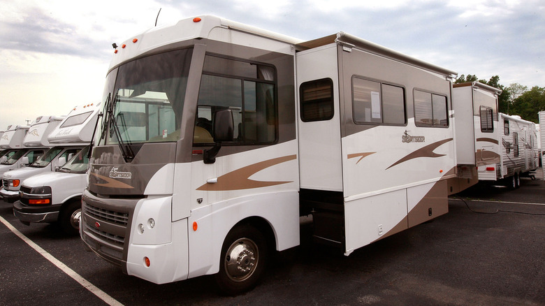 Different classes of motorhome on a dealership lot