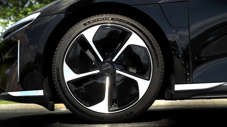 A close-up of the wheels and tires on a Lucid Air fitted with Michelin Pilot Sport EV tires