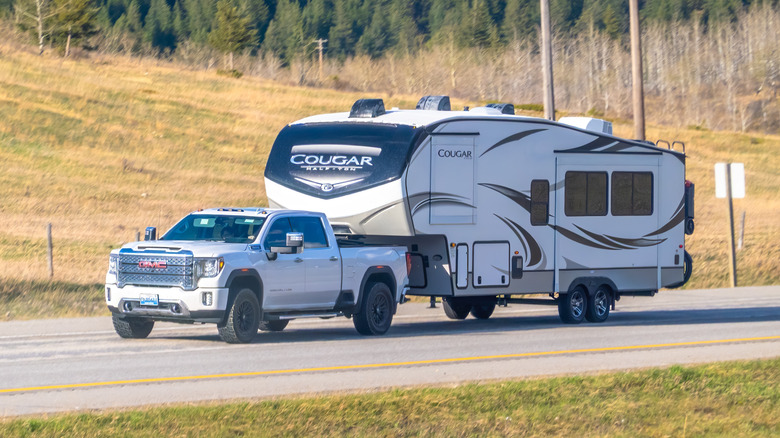 GMC Sierra towing a fifth-wheel trailer