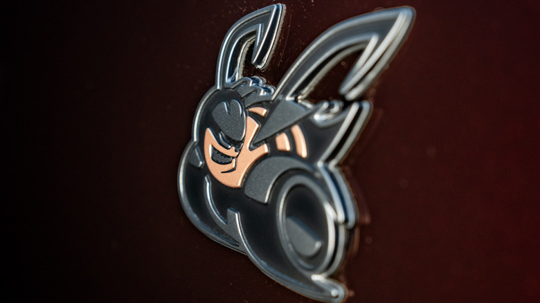 Dodge Charger Scat Pack badge detail with Red Oxide color