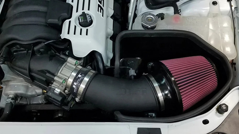 A JLT cold air intake installed in a Dodge Charger