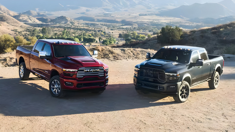 Two Ram trucks parked side by side