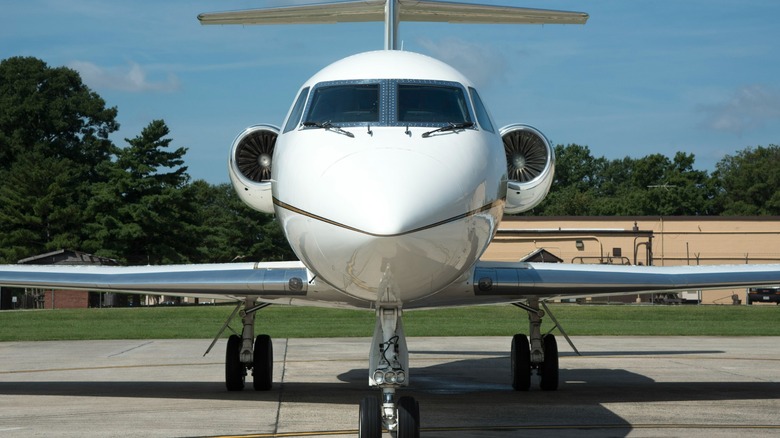 A C-20 Gulfstream jet parked on a runway.