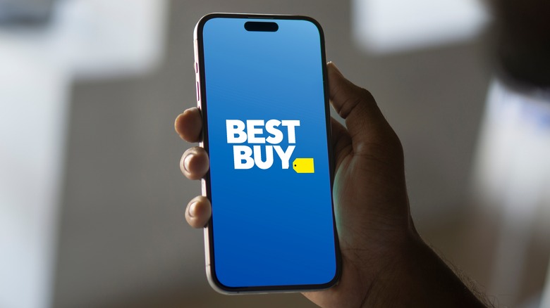 Best Buy logo is displayed on smartphone