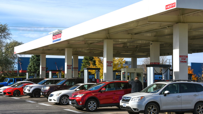 A line of cars filling up at the Costco Wholesale gas station, which offers discounts on gas to people with paid memberships.
