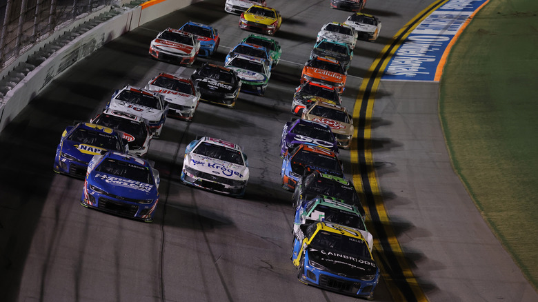 NASCAR pack racing at 2025 Daytona 500, front-view